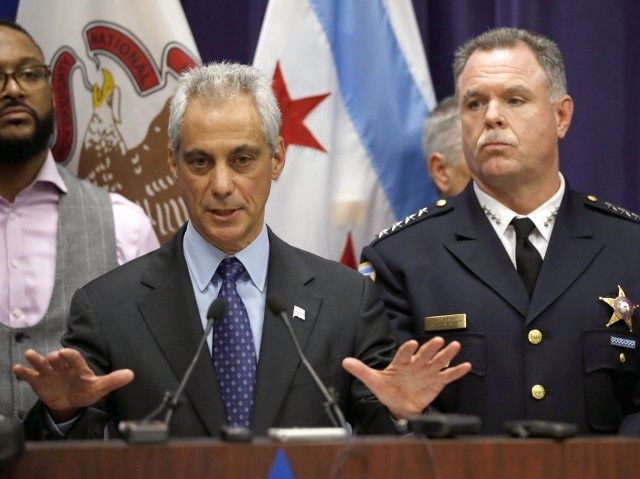 Chicago Mayor Rahm Emanuel (left) dismissed Police Superintendent  Garry F. McCarthy (right) after public furor over a withheld police car dashcam video showing a Chicago police officer shooting a suspect 16 times who was walking away from the officer.