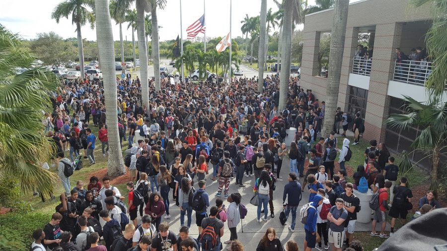 Hundreds of Olympic Heights students participated in a "walk-out" in order to demonstrate against school shootings like the one at Marjory Stoneman-Douglas last week. 