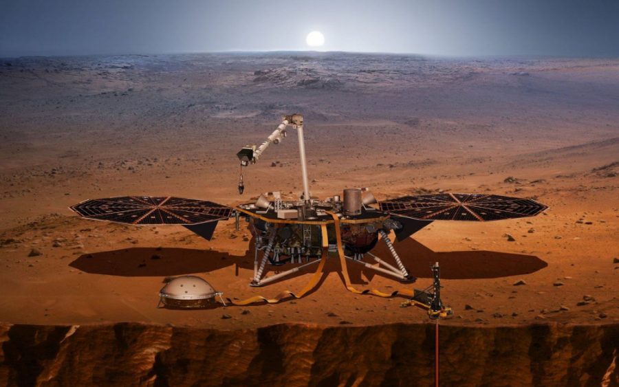 An artists illustration of InSight on a photo background of Mars shows the lander fully deployed.