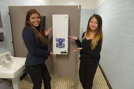 Schools in New York and a few other states have free feminine hygiene product dispensers in their girls' restrooms.