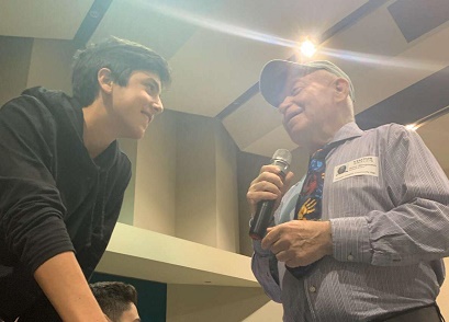 Holocaust survivor Sami Steigmann responds to a question from OH sophomore Tyler Levin during an October 29 presentation.