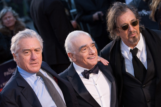 Netflixs most ambitious original film project The Irishman,  directed by Martin Scorsese (center) and starring Robert DeNiro (left) and Al Pacino (right), is at the center of a showdown between Netflix and major movie theater chains.