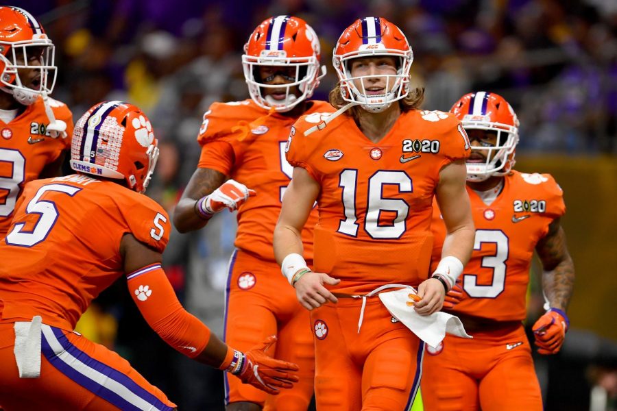 Quarterback Trevor Lawrence, #16, and the Clemson Tigers are the early favorites to win the 2020 COVID-19 altered seasons championship