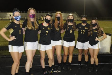 The Olympic Heights girls soccer team, behind the leadership of its seniors (pictured above celebrating Senior Night), has a current record of 8-3-4.