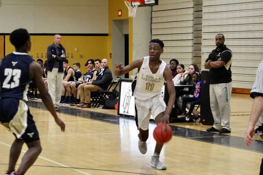 Micah Octave (11), the Sun-Sentinels Palm Beach County large schools Player of the Year, helped  lead the Olympic Heights boys basketball team to an undefeated regular season.