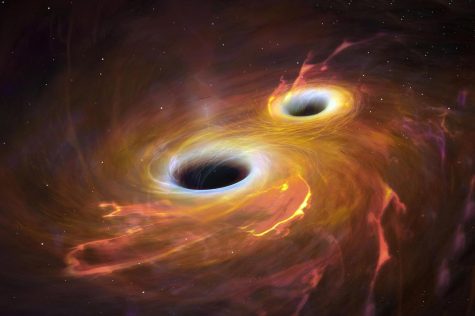 Scientists predict that an expected massive black holes collision puts Earth at risk...10,000 years from now