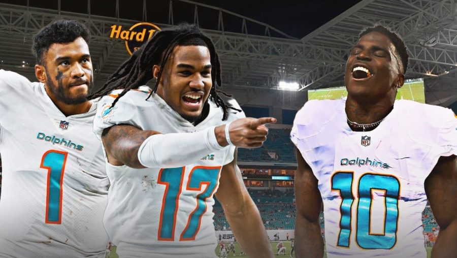 Tyreek Hill (right) joining Jaylen Waddle (center) gives Miami Dolphins quarterback Tua Tagovailoa (left) the fastest wide receiver duo in the history of the NFL.