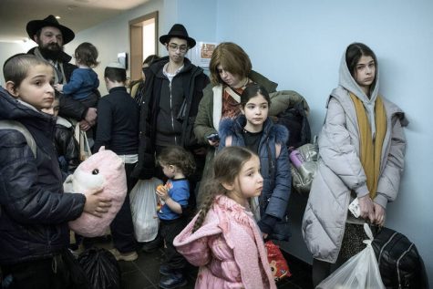 Jewish Ukrainian refugees arrive at a Berlin shelter.