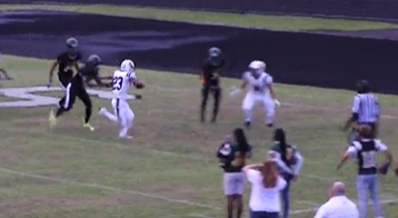 Olympic Heights senior running back Sean Lutin (#23) scores the Lions first touchdown of the 2022 season on a 3-yard run against Suncoast in last Thursday nights 14-12 victory.