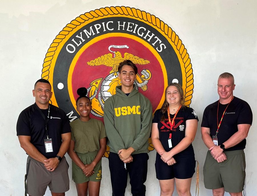 The Olympic Heights Marine Corps JROTC are lead by (from left):  instructor Master Sergeant Carlos Jarquin, Executive Officer Naika Pierre, Battalion Commander Christopher Sandlin, Sergeant Major Lillian Philips, and instructor Master Sergeant Wayne Byron.