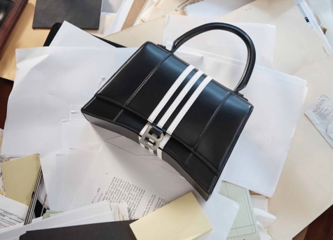 One photo from The Balenciaga Gift Shop ad campaign features a handbag over legal documents pertaining to child pornography, seemingly suggesting the documents are irrelevant.