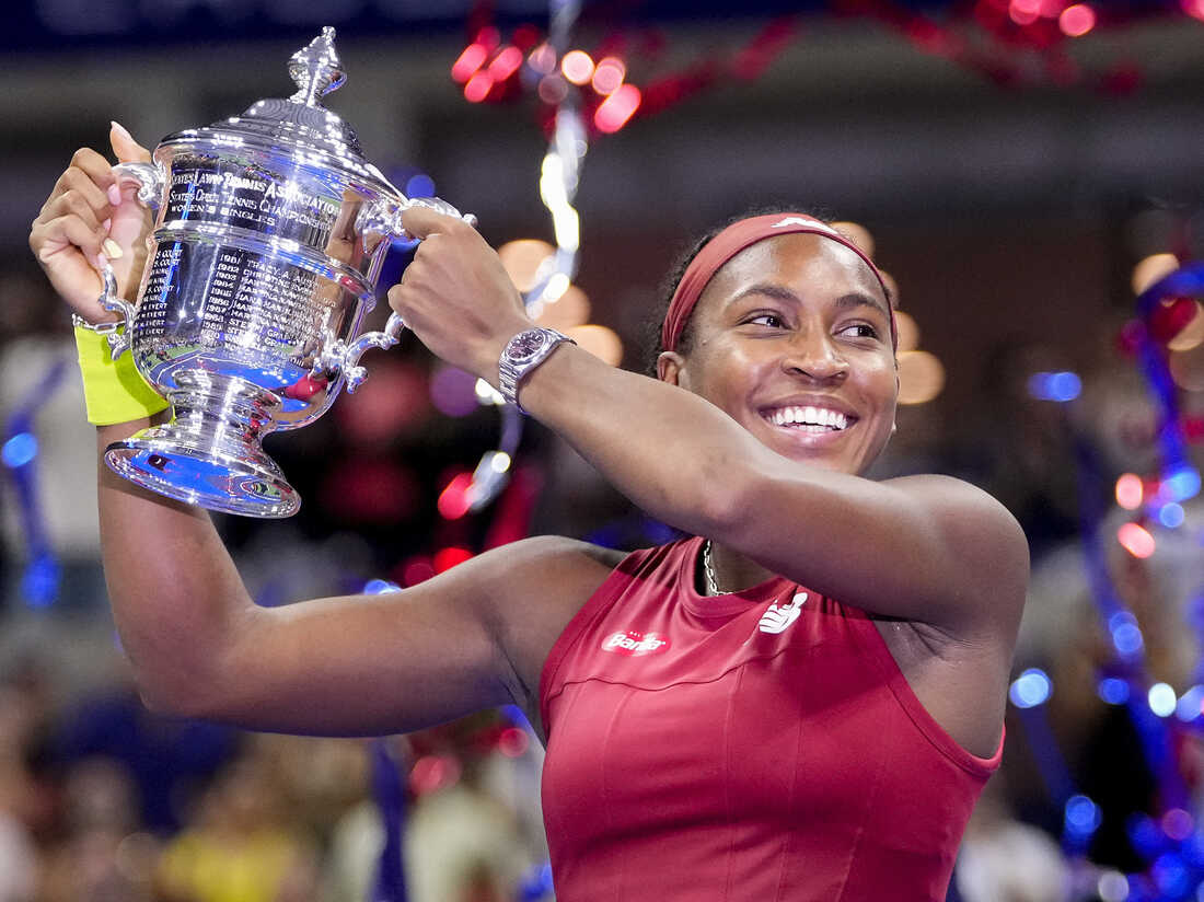 Coco Gauff, of the United States, holds up the championship trophy after defeating Aryna Sabalenka, of Belarus, in the womens singles final of the U.S. Open tennis championships, Saturday, Sept. 9, 2023, in New York. (AP Photo/Frank Franklin II)