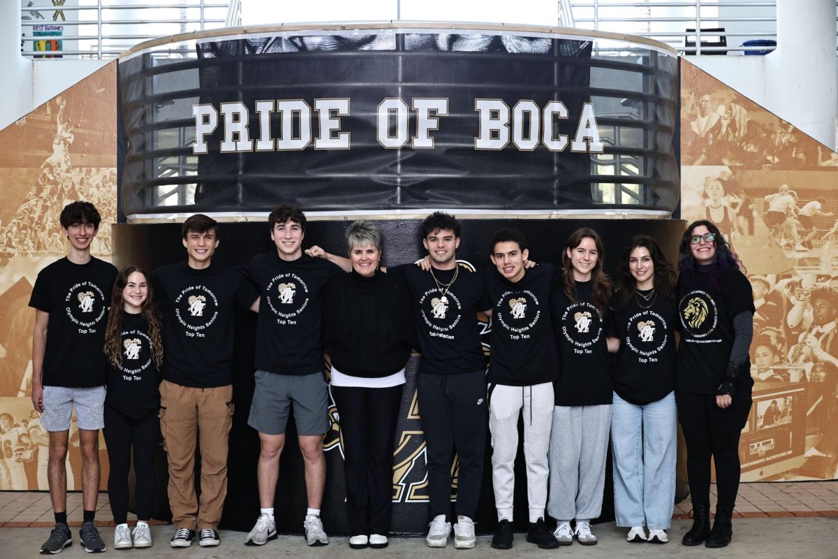 From left to right: Russell Etzler, Lola Kevitch, Jonathan Robson, Ryan Sacher, Mrs. Burke, Andrew Canter, Piero Morales, Samantha Cuenot, Chloe Legerman, and Carly Sirkin 